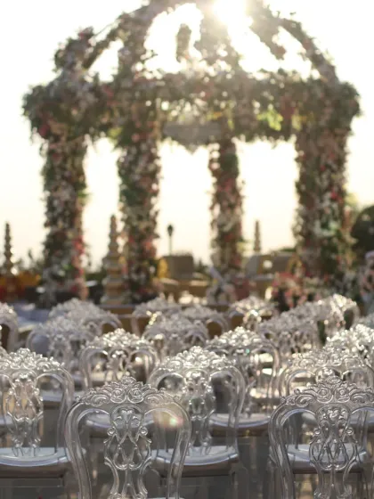 The sun setting over the mandap. This magical light is what we strive to capture in our live event paintings.