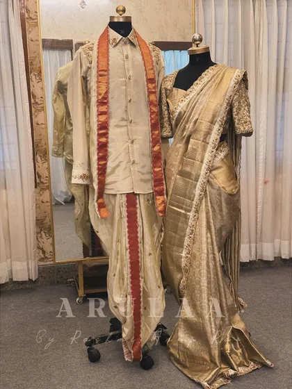 Creating a unified look for the bride and groom is one of my favorite things to do. Here's a preview of a coordinated muhurtham set, featuring a hand-embroidered Kanjivaram saree for her and a matching embroidered raw silk kurta and dhoti for him.