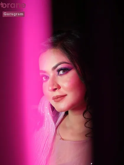An artistic shot of the lavender look using colored lighting. This shows the creative photography techniques I incorporate into our portfolio shoots.