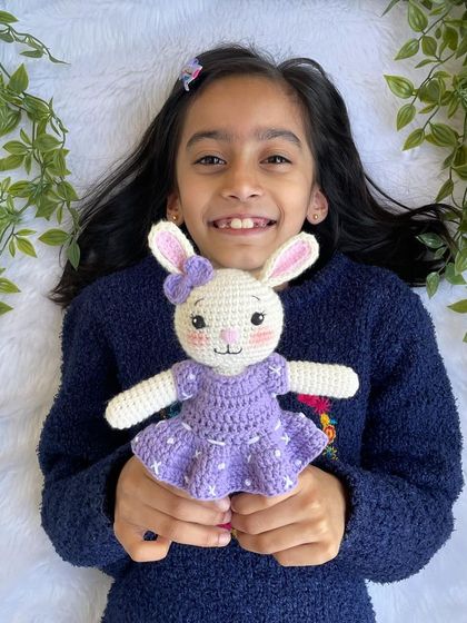 A lovely bunny in a purple dress with a custom initial "Q" on it. I made a similar one for my own daughter's birthday, and she absolutely adores it!