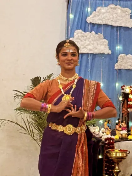 Another photo from the Shivratri event, showing a traditional mudra in full costume.