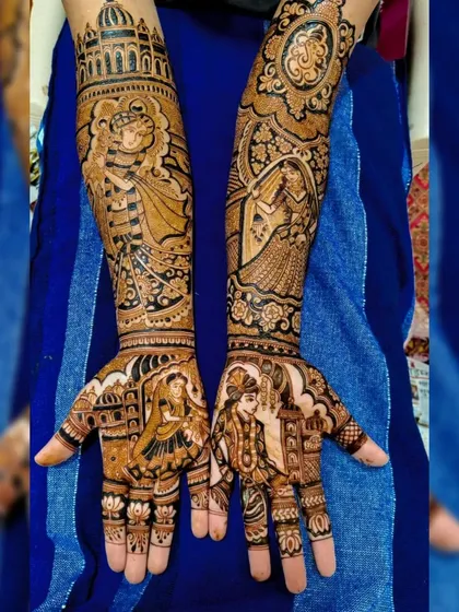 This intricate design combines portraits of Radha-Krishna with portraits of the bride and groom, blending the divine with the personal.