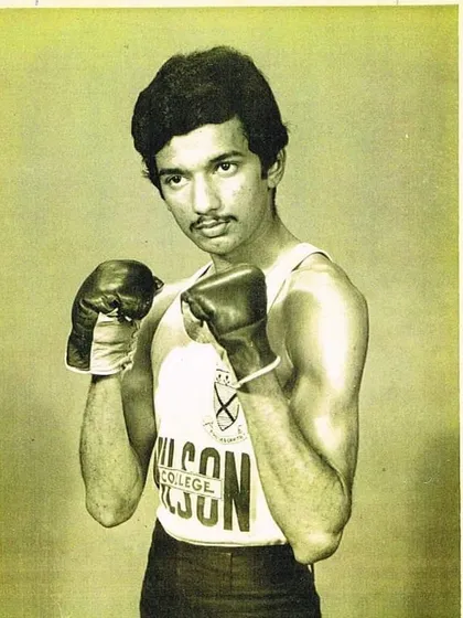This is me, Rajan, back in my fighting days representing Wilson College. My entire life has been dedicated to this sport, and I bring decades of in-ring experience to every single training session. I've been where you want to go.
