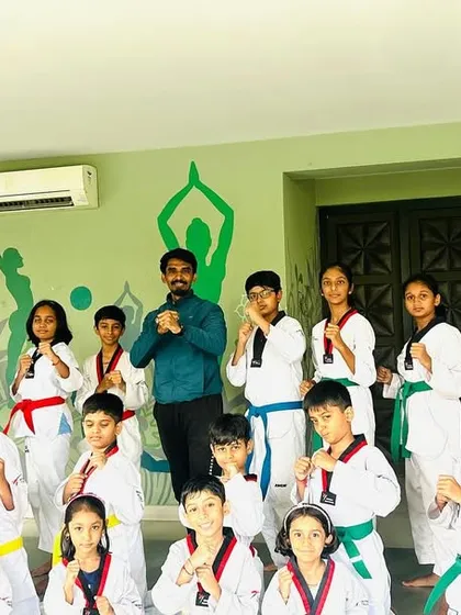 A group photo with my students. Seeing them grow in discipline, strength, and confidence is my biggest achievement as a coach.