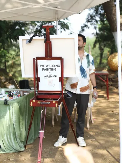 Our live painting setup at Prajakta Koli's wedding venue. We set up our easel where guests can watch the creative process unfold.