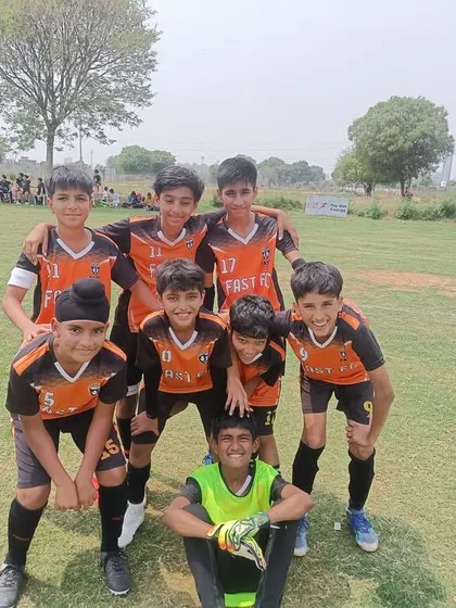 The U11 runners-up team posing for a photo after the Junior League tournament.