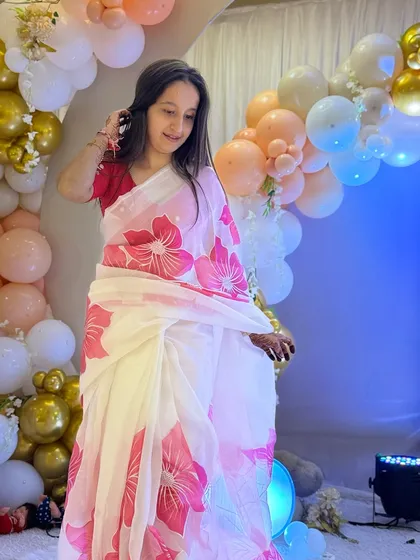 A candid, happy twirl in my saree at the baby shower.