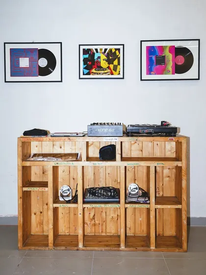 The DJ setup at the exhibition, complete with framed records from our label. The exhibition itself became a live music venue, with DJ sets scheduled throughout its run.