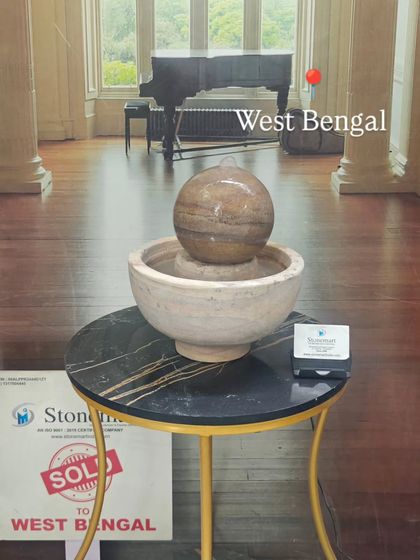 Another view of the sold tabletop fountain, showing the natural color variations in the Rainbow Sandstone.