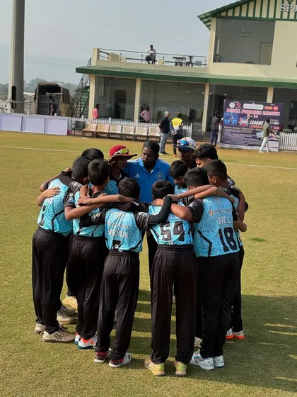 Another angle of our team huddle. The unity and focus before a big game is something special.