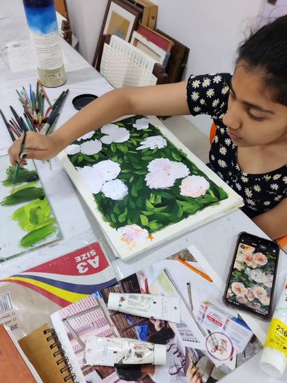 The creation of a beautiful floral piece using thick, impasto-style acrylics, showing a different approach to painting flowers.