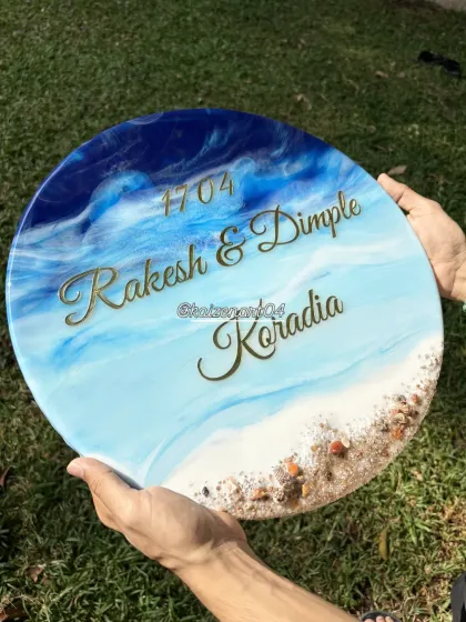A closer look at the details on this custom ocean nameplate. You can see the depth in the waves and the texture from the sand. Every piece is handcrafted to be unique.