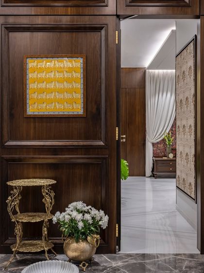 I went all out classical with this one. The entrance lobby to the bedrooms showcases stunning wooden paneling that steals the spotlight. Every detail is carefully crafted to bring this timeless space to life.