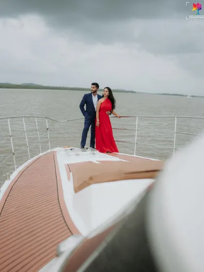 A wide-angle shot from the bow of the yacht, emphasizing the vastness of the water and the feeling of a shared adventure ahead.