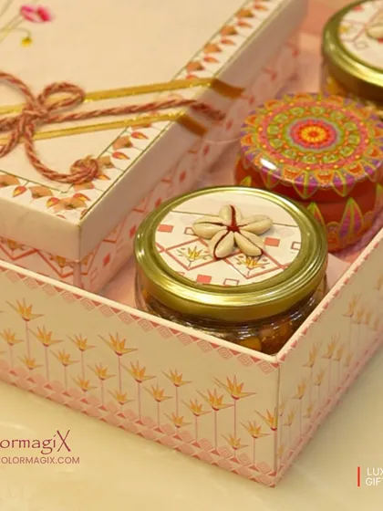 A close-up of one of our beautifully designed hamper trays. The intricate details, from the shell-adorned jar to the printed box, highlight our commitment to craftsmanship.