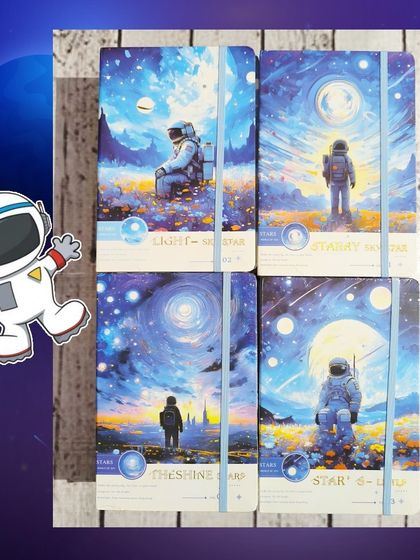 This space-themed gift set includes a notebook and a fridge magnet, all packed in a custom paper bag that says "Thank you for making my birthday OUT OF THIS WORLD!"