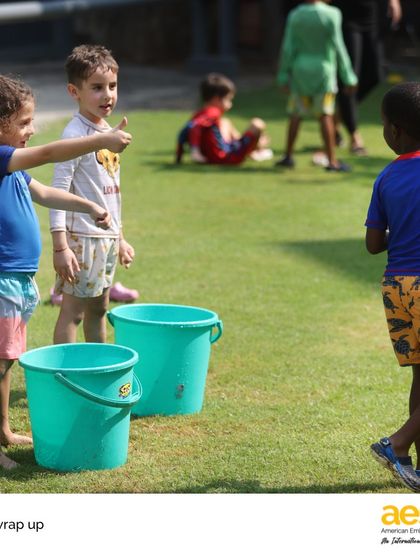 Pre-Kindergarten students enjoy water games on the lawn to celebrate the end of the school year. We believe in joyful, play-based learning, and this splash day is a perfect example of that philosophy in action.
