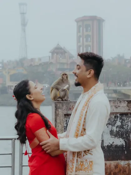 A fun, unscripted moment from a Haridwar pre-wedding shoot, where a monkey photobombed the couple, leading to genuine laughter.