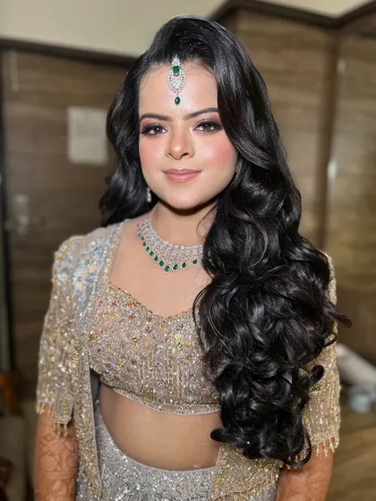 The makeup is perfectly balanced to be glamorous but not overpowering.