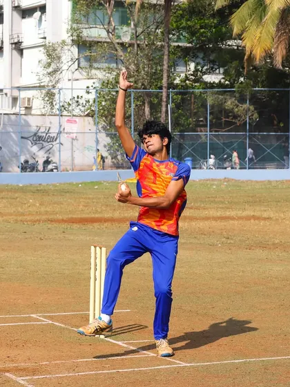 A young spinner in action during a practice game, learning to vary his pace and flight.
