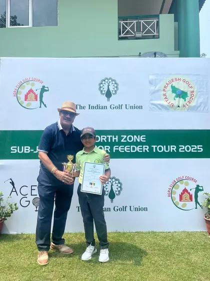 Vedaansh Jain receives the Winner’s Trophy in Category D Boys at the IGU North Zone Sub-Junior/Junior Feeder Tour.