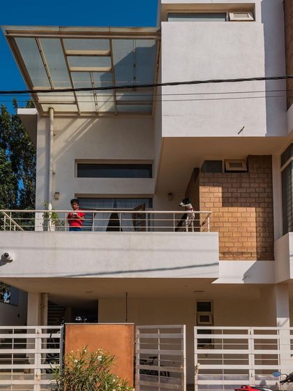 A closer look at the balcony of Anand and Madhu's home, where the residents can connect with the outdoors. The design thoughtfully incorporates covered and open spaces.