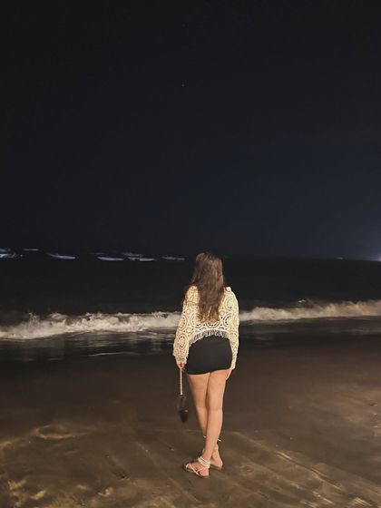 Standing by the waves at night. The sound of the ocean is the best therapy.