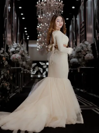 This fairy-like white gown was a dream to wear. The mermaid cut and tulle train made me feel like I was in a fairytale.
