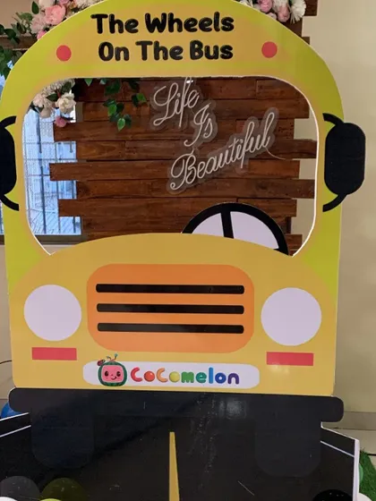 I also create themed photo booths for parties. This Cocomelon "Wheels on the Bus" photo frame was a huge hit with the kids and parents.