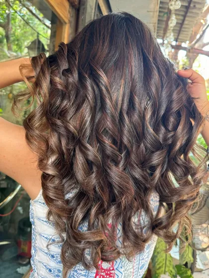 Another angle of the 'Espresso' hair, showing the beautiful curls and rich, non-bleach color.