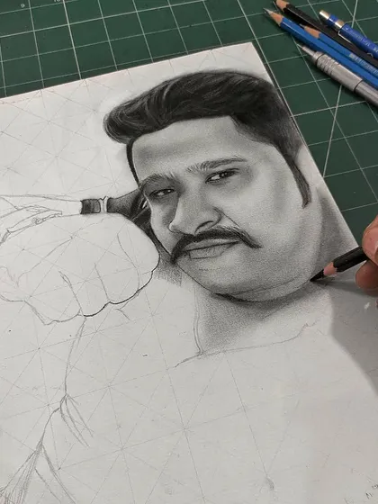 An identical shot to the previous one, showing the steady, careful process of building up layers in a realistic graphite portrait.