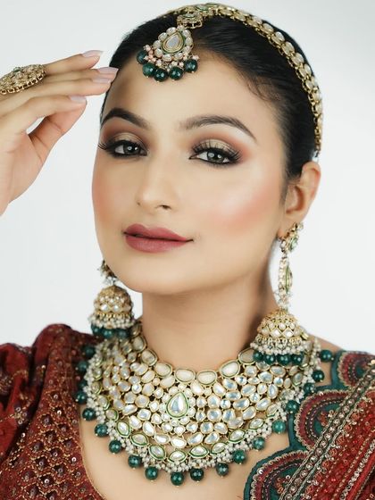 The focus here is on the perfect placement of the bindi and how the makeup complements the traditional jewelry. I teach a holistic approach to bridal styling.