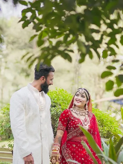 A walk in the park, hand in hand. We use natural, open spaces to help our couples relax and just be themselves, resulting in beautiful, candid wedding portraits.