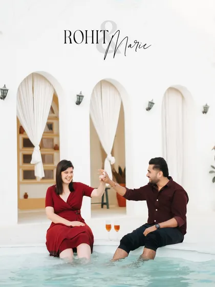 A personalized portrait with the couple's names, capturing a happy moment as they enjoy their poolside pre-wedding shoot.