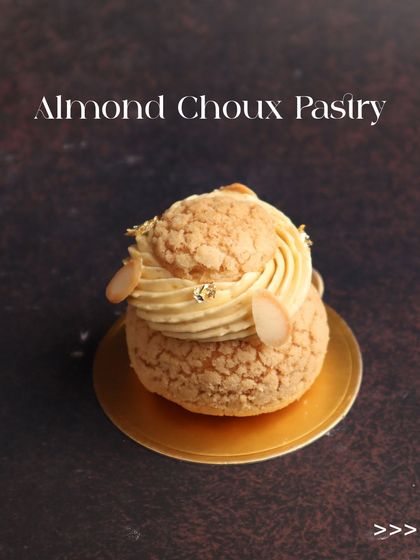 This is my Almond Choux Pastry, a delightful variation with a nutty flavour profile. The creamy almond filling and toasted almond garnish make it a sophisticated and satisfying treat.