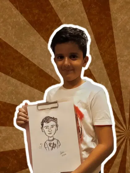 Another shot of Panit with his cool caricature. He looks so proud of his cartoon self.