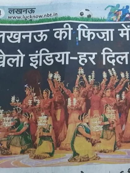 A newspaper clipping from Navbharat Times covering the Khelo India 2023 opening ceremony. This image shows a beautiful formation from our choreographed act, featuring dozens of dancers in traditional attire.