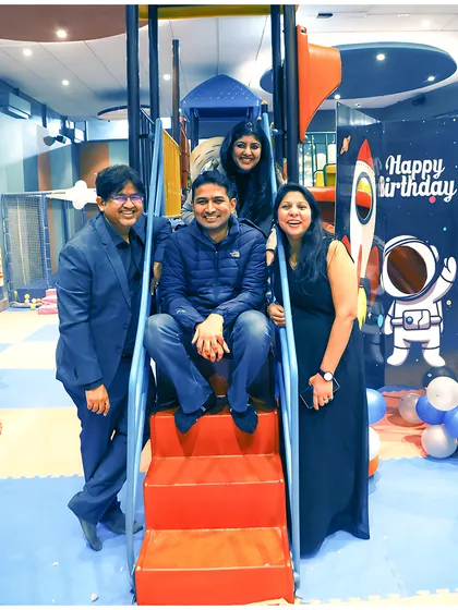 Even the adults can't resist the play structures. It's all about shared fun and making memories together.