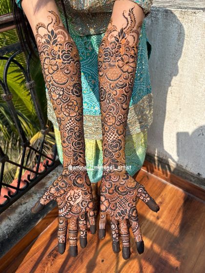 This design, captured in the sunlight, shows the beautiful texture and detail of my work. The pattern is a mix of florals and traditional motifs.