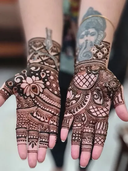 This bridal design was so fun to create, working around the client's existing tattoos to create a cohesive and beautiful piece of art.