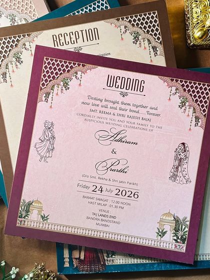 A beautiful wedding insert with a magenta border and archway motif, designed to coordinate with a grand, palace-themed invitation.