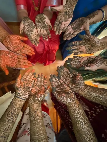 A top-down view of the henna for the bride and her squad. I love seeing all the different patterns and stains together.
