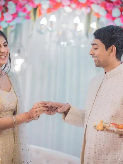 A happy interaction during the ring ceremony, filled with smiles and joy.
