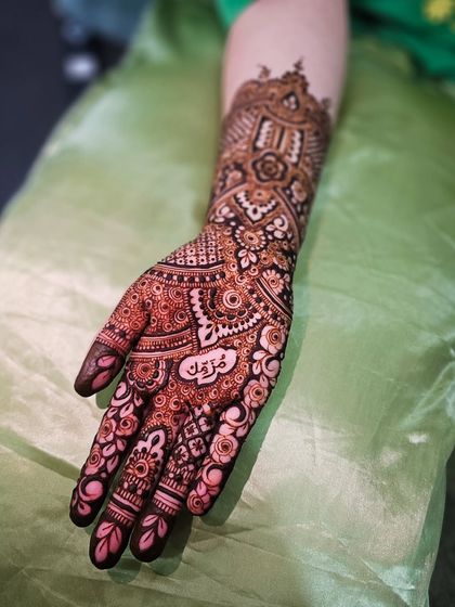 Another view of the anniversary henna, showcasing the intricate floral and paisley work.