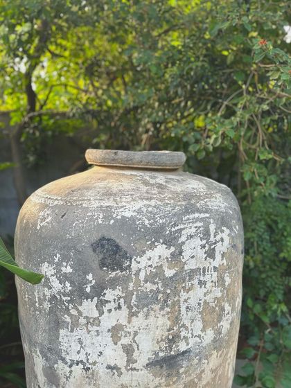 A beautiful vintage pot with a naturally weathered and distressed grey finish, perfect for an authentic, aged look.