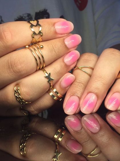 A lovely set of nails with a translucent, jelly-like pink polish.