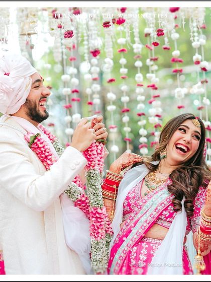 A moment of pure fun and laughter during the Varmala ceremony. Weddings should be joyous, and I love it when couples can be playful during the rituals.