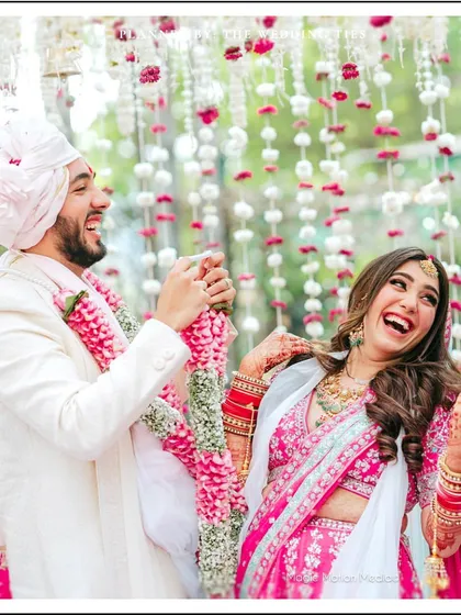 A moment of pure fun and laughter during the Varmala ceremony. Weddings should be joyous, and I love it when couples can be playful during the rituals.