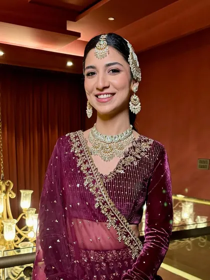 The joy of a bride on her wedding day is what it's all about. Her makeup was designed to be comfortable and long lasting, ensuring her smile was the brightest thing in the room.