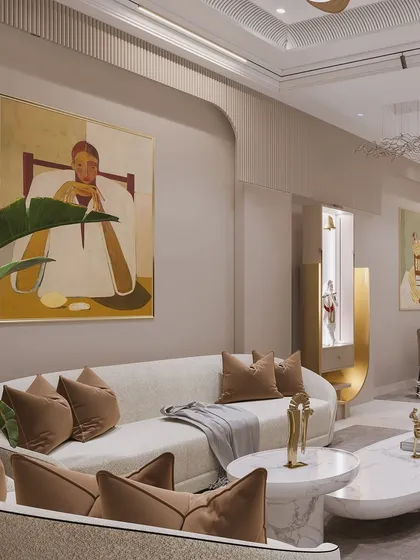 This angle highlights the curated art and sculptural forms that define the living space, creating a gallery-like feel.